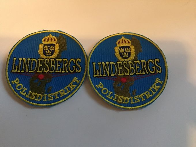 Lindesberg variant med svart bård på texten